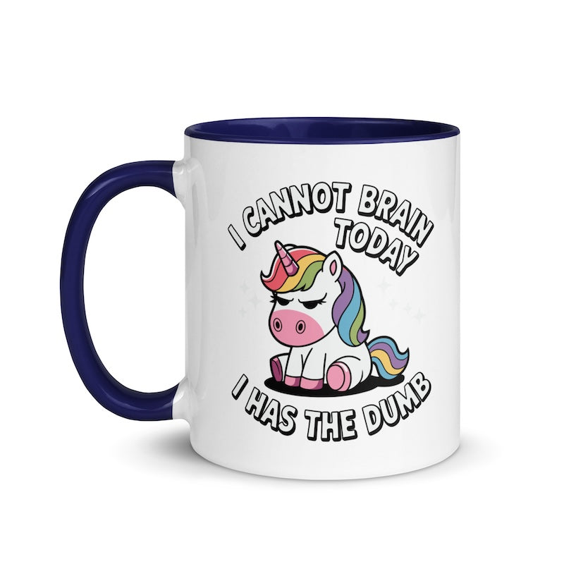 Mug with a unicorn graphic and humorous text on a white background