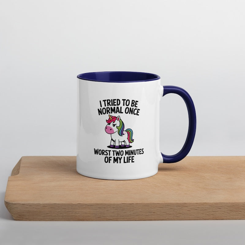 Mug with unicorn design and text on a wooden surface