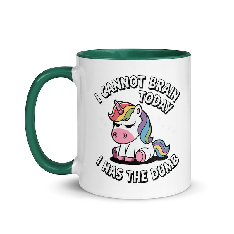 Mug with a cartoon unicorn and humorous text on a white background