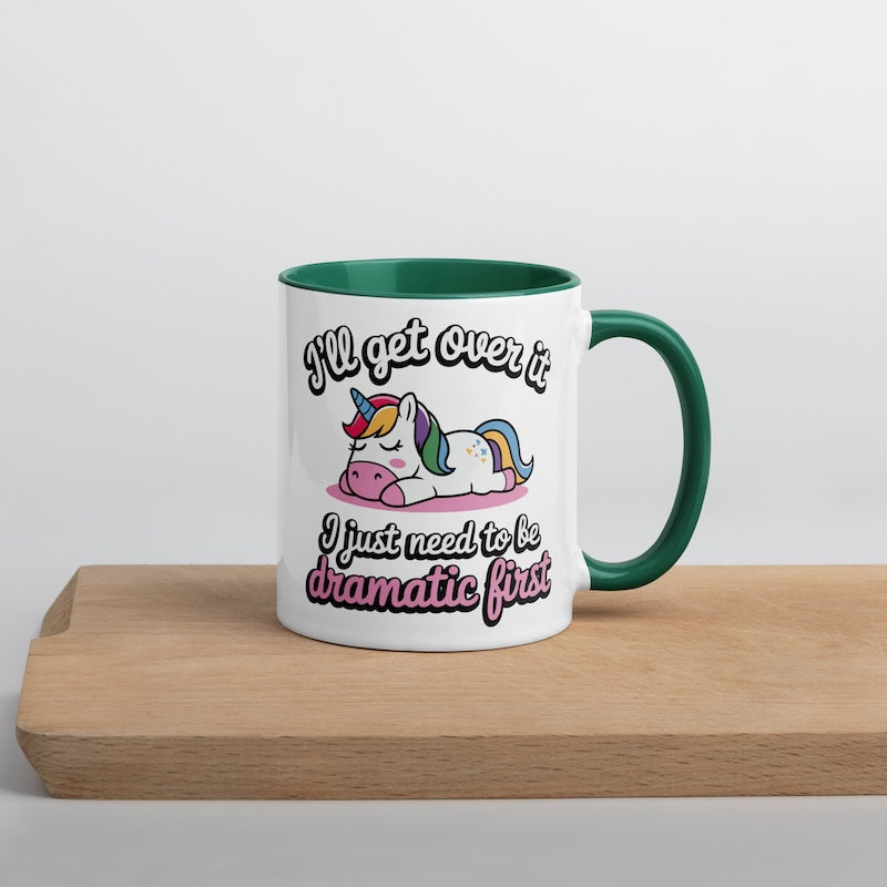 Mug with unicorn design and text on a wooden surface