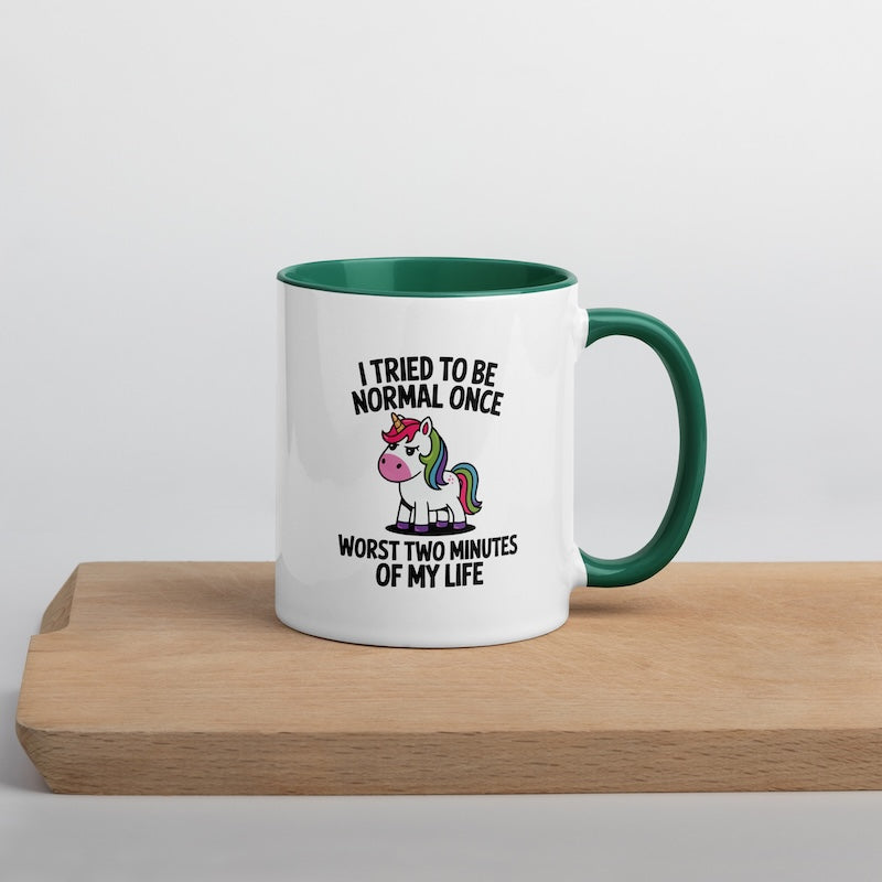 Mug with unicorn design and text on a wooden surface