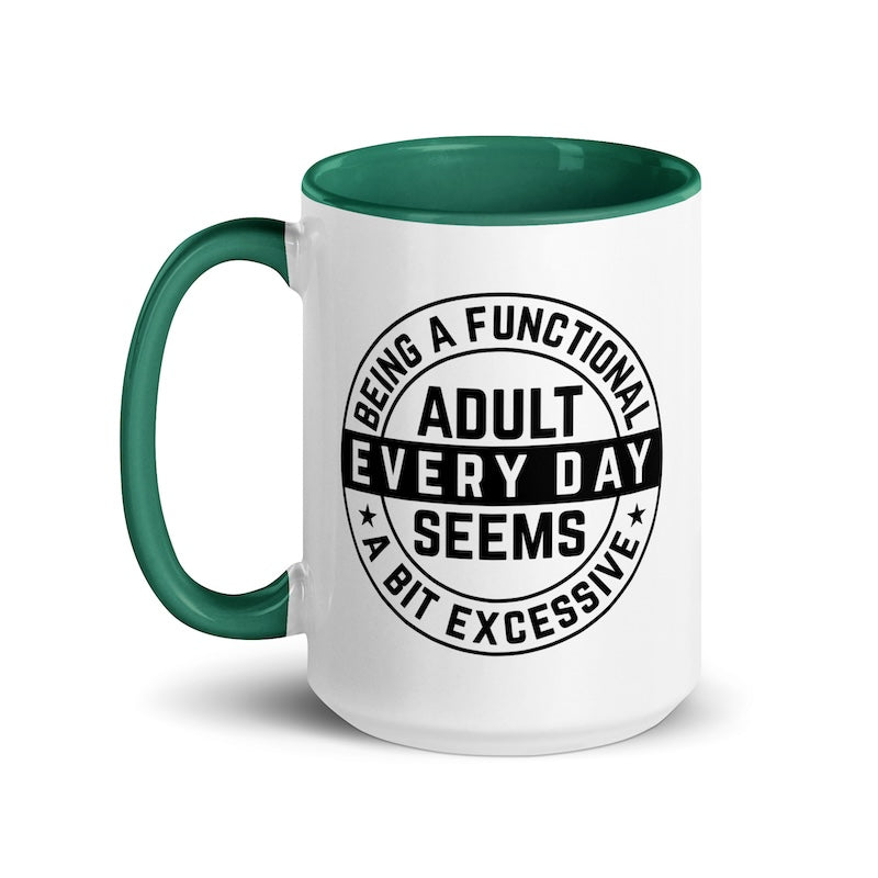 Mug with green interior and handle, featuring a humorous quote about being an adult on a white background.