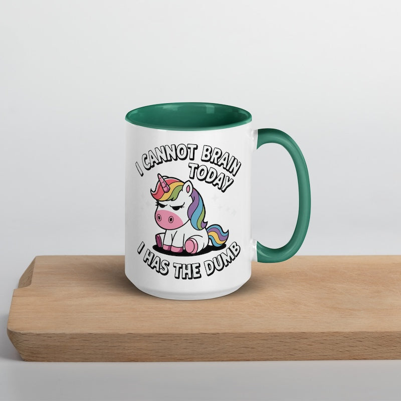 Mug with unicorn design and text on a wooden surface