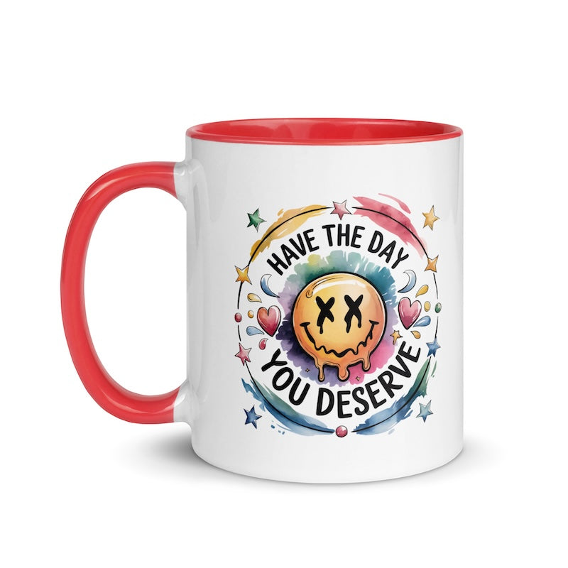 Mug with smiley face and motivational quote on a white background