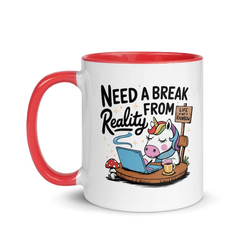 Mug with cartoon unicorn, laptop, and 'Need a Break from Reality' text on a white background