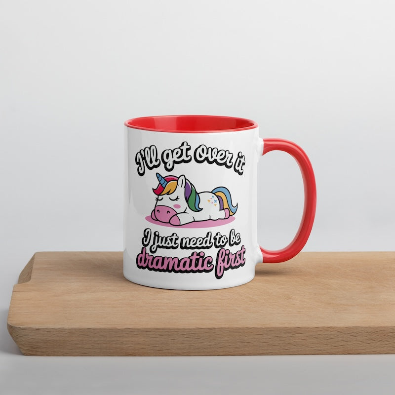 Mug with unicorn design and text on a wooden surface