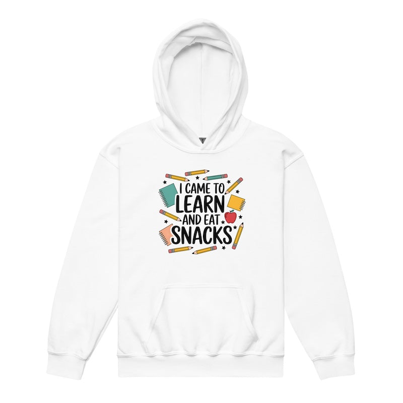 White hoodie with text 'I came to learn and eat snacks' and school supplies graphics on a white background
