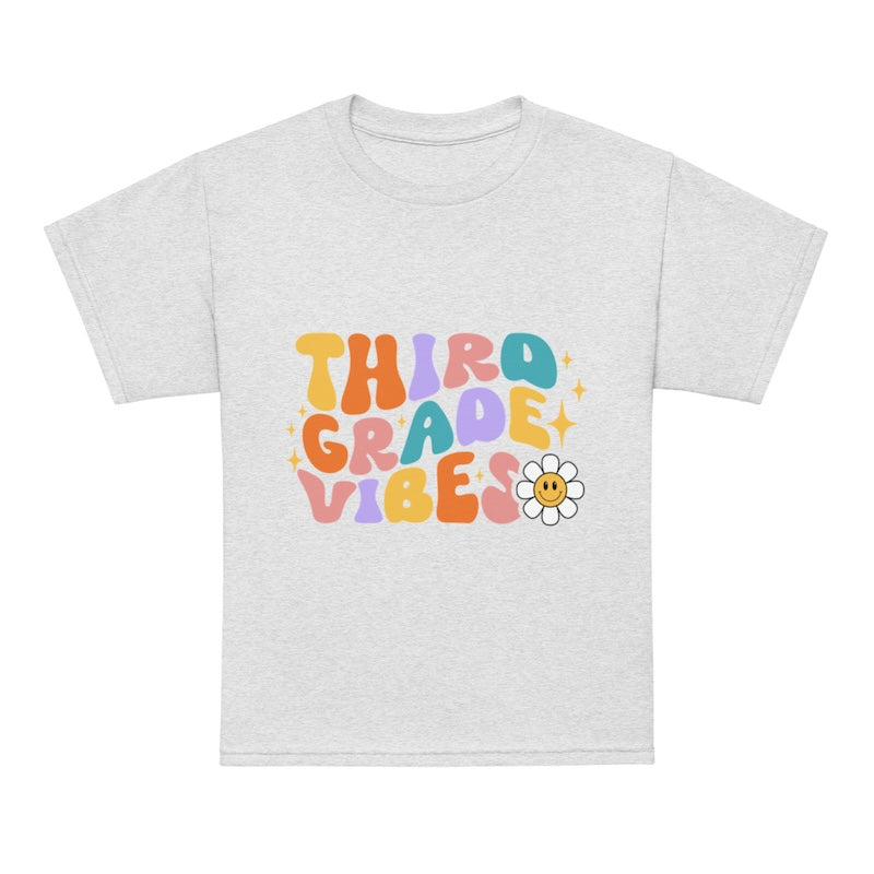 Gray t-shirt with 'Third Grade Vibes' text in colorful letters on a white background