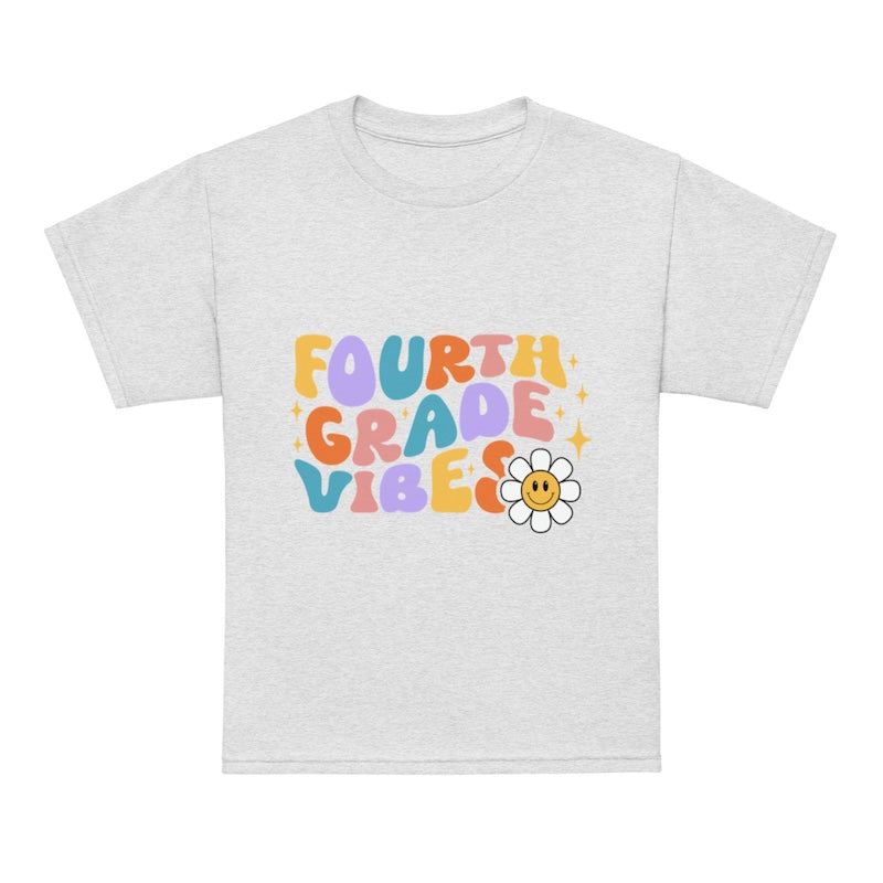 Gray t-shirt with 'Fourth Grade Vibes' text and a flower graphic on a white background