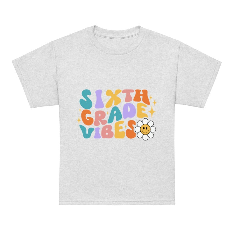 Gray t-shirt with 'Sixth Grade Vibes' text and a flower graphic on a white background
