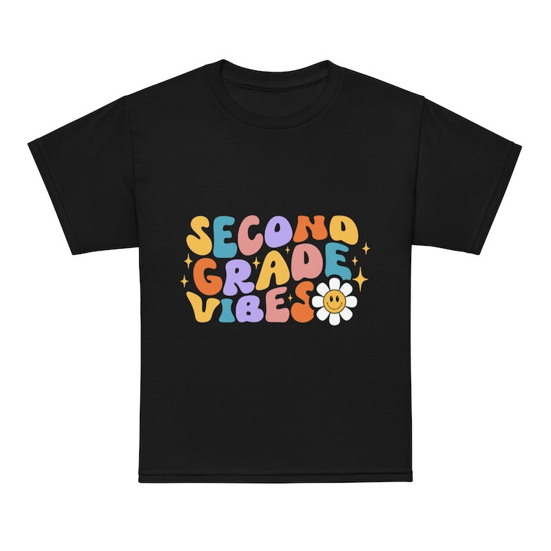 Black t-shirt with colorful 'SECOND GRADE VIBES' text and a flower graphic on a white background
