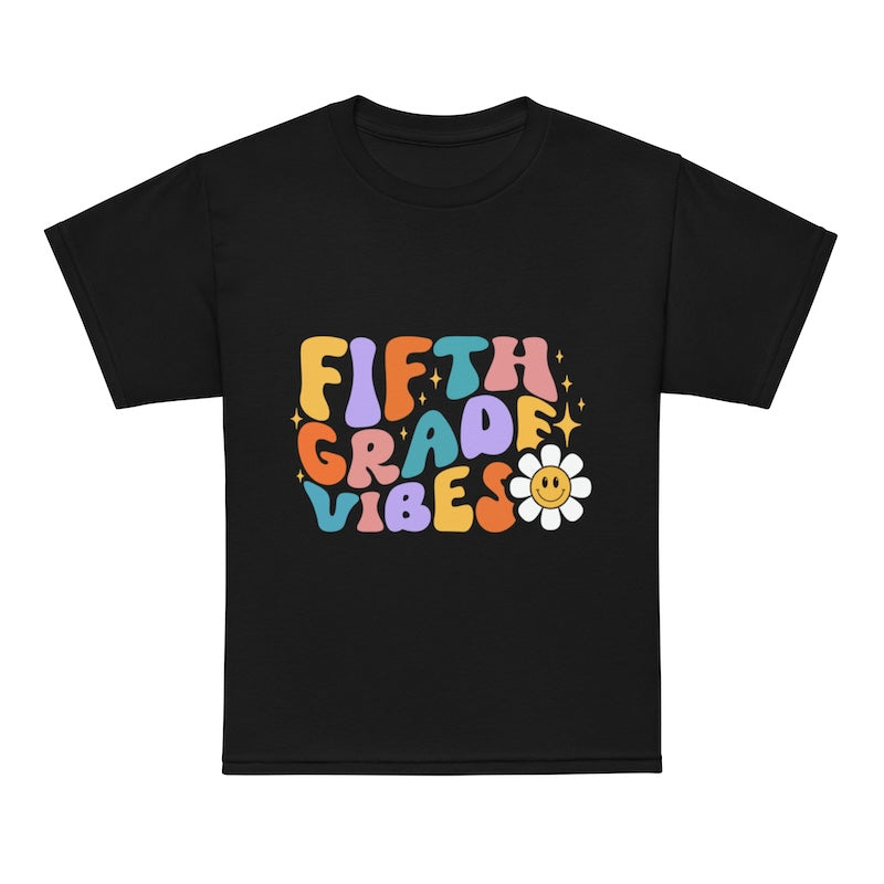 Black t-shirt with colorful 'Fifth Grade Vibes' text and a flower graphic on a white background
