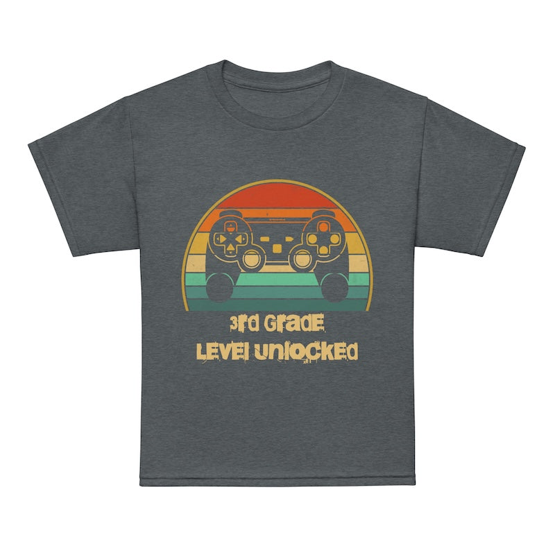 Gray t-shirt with a colorful graphic and text '3rd Grade Level Unlocked' on a white background