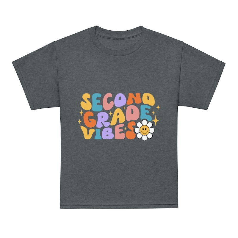 Gray t-shirt with 'SECOND GRADE VIBES' text in colorful letters on a white background